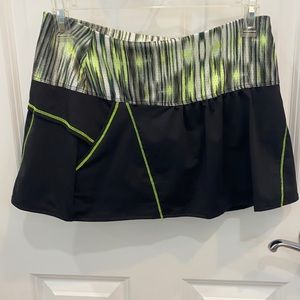 Lucky in lve tennis skirt. Has ball pocket and nike short attached.